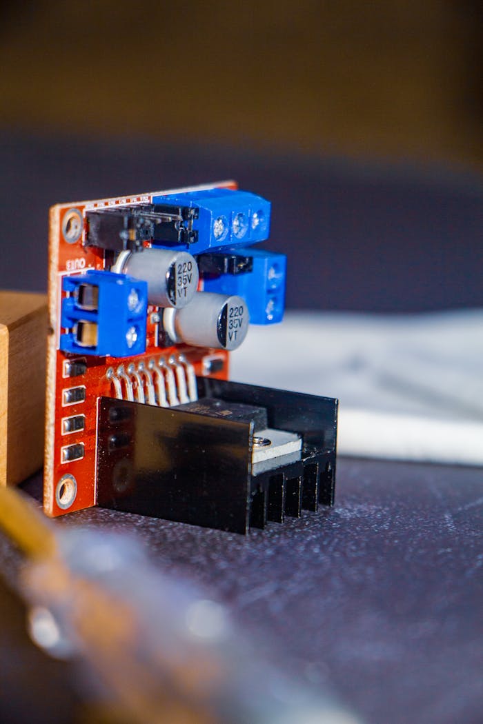 Detailed image of an electronic circuit board with capacitors and connectors, showcasing technology innovation.